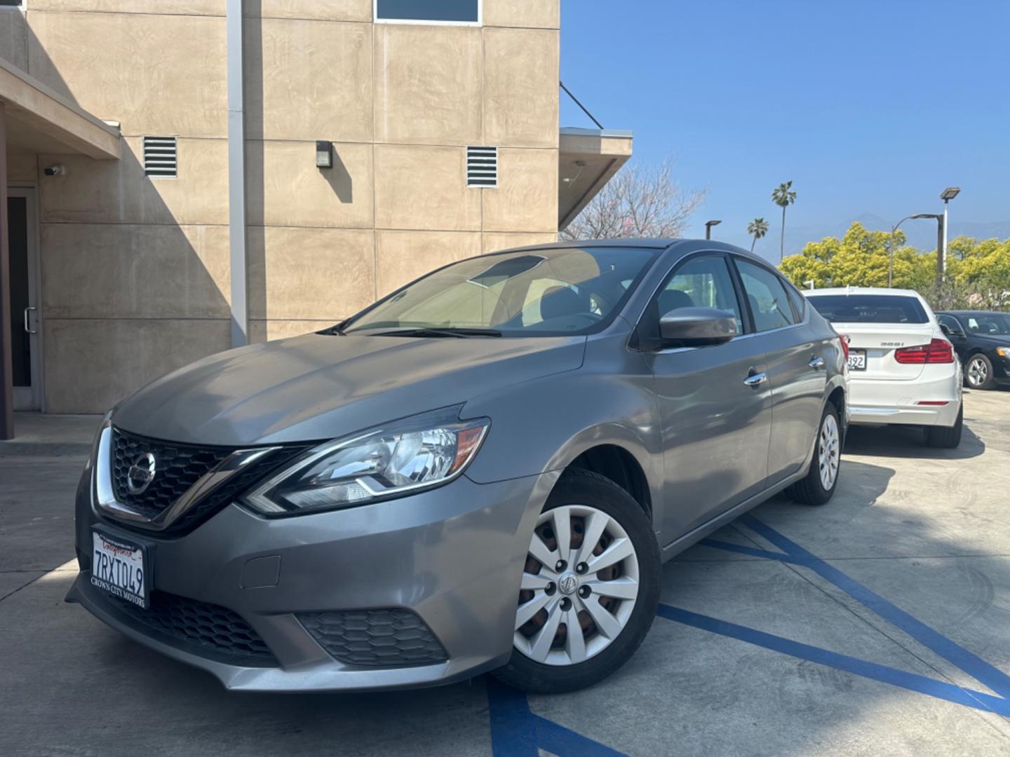 2016 Silver /Black Nissan Sentra FE+ S (3N1AB7AP7GY) with an 1.8L L4 SFI DOHC 16V engine, CVT transmission, located at 30 S. Berkeley Avenue, Pasadena, CA, 91107, (626) 248-7567, 34.145447, -118.109398 - Photo#0